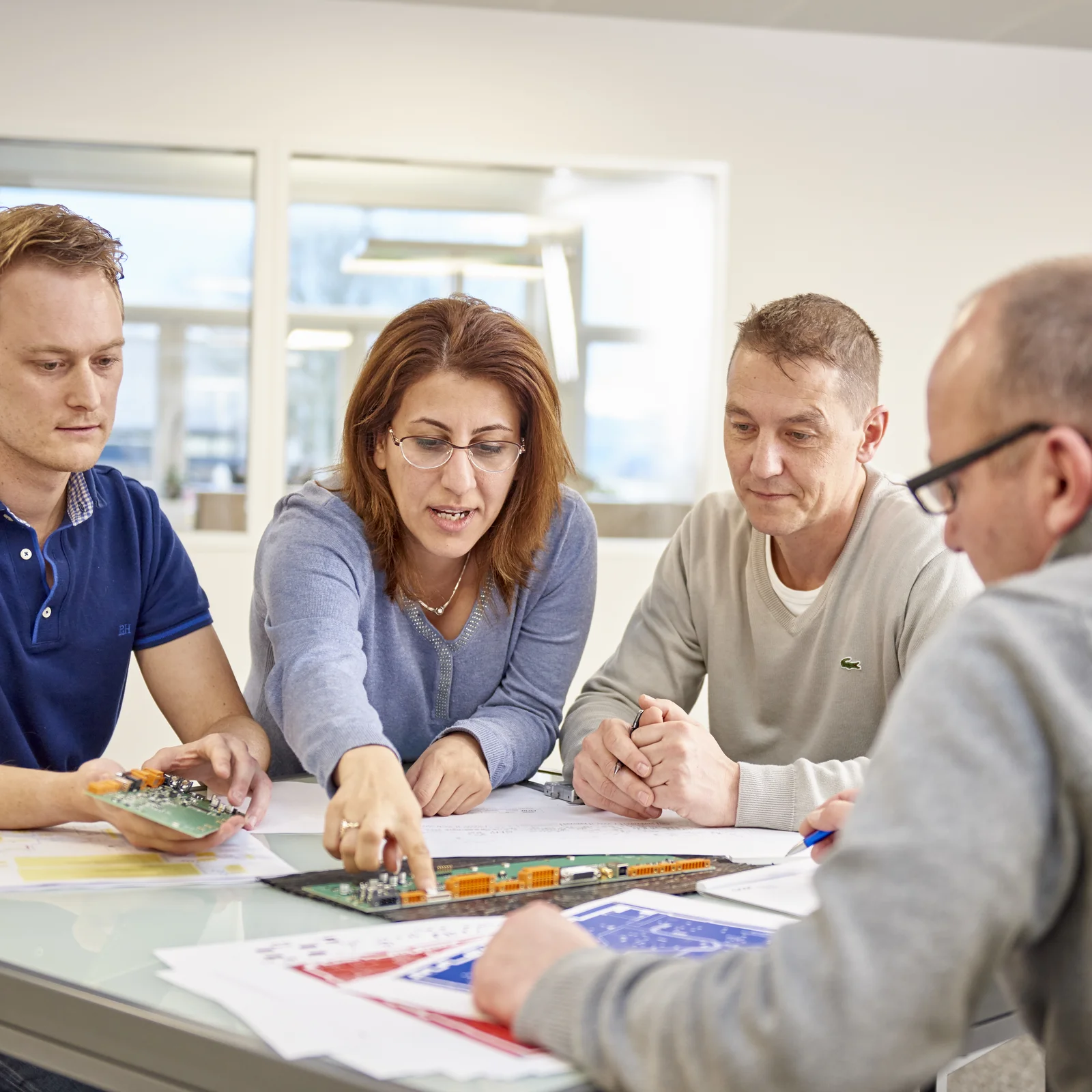 Cicor engineering team discussing a project