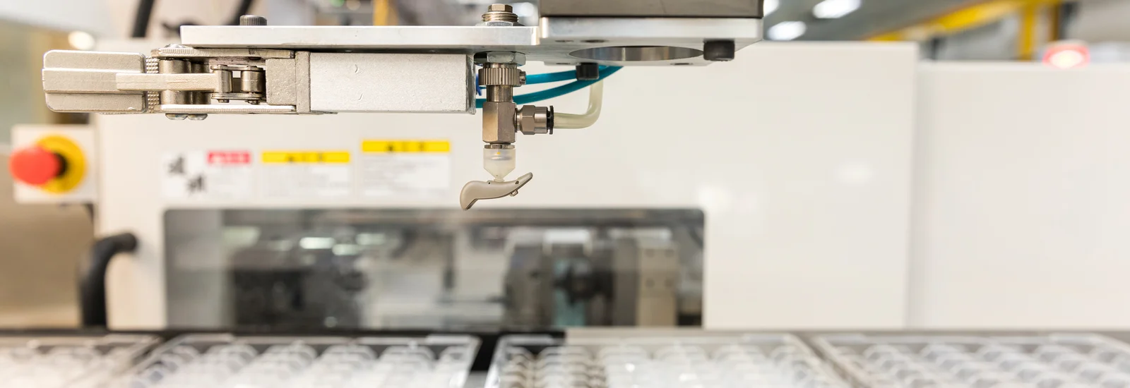 Plastic injection molding of a hearing aid component at the Cicor site in Batam