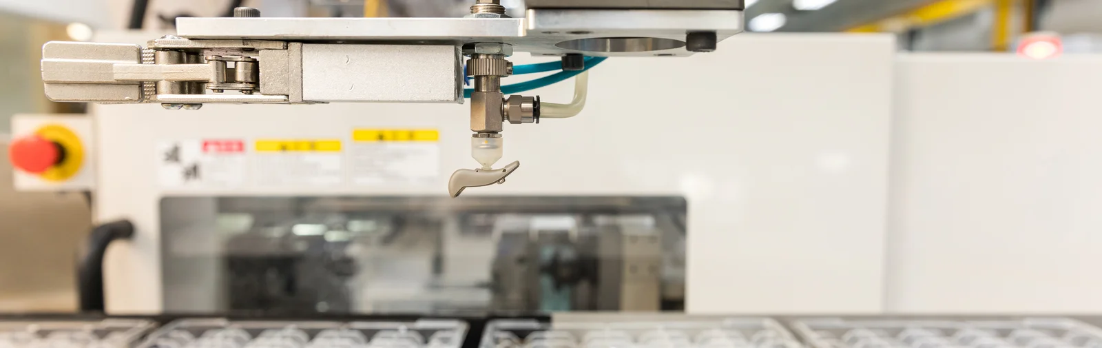 Plastic injection molding of a hearing aid component at the Cicor site in Batam